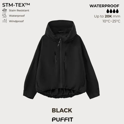 🧥Κουκούλα με φαρδύ γείσο💧Κοντό, oversized αδιάβροχο μπουφάν με φουσκωτό στρίφωμα και ρυθμιζόμενες μανσέτες