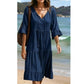 Γυναικείο φόρεμα μέσης μήκους με V-neck, φούντες και στρωματοποιημένη γραμμή