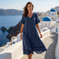 Γυναικείο φόρεμα μέσης μήκους με V-neck, φαρδιά γραμμή και φούντες