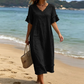 Γυναικείο φόρεμα μέσης μήκους με V-neck, φαρδιά γραμμή και φούντες