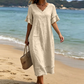 Γυναικείο φόρεμα μέσης μήκους με V-neck, φαρδιά γραμμή και φούντες