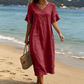 Γυναικείο φόρεμα μέσης μήκους με V-neck, φαρδιά γραμμή και φούντες