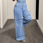 Smygande jeansdräkt