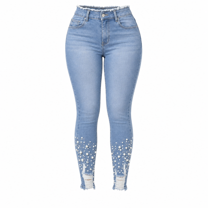 Ljusblå smala skinnyjeans för kvinnor med pärlbesättning, oförarbetad och nött midja samt slitage och riffiga fotutsvängar